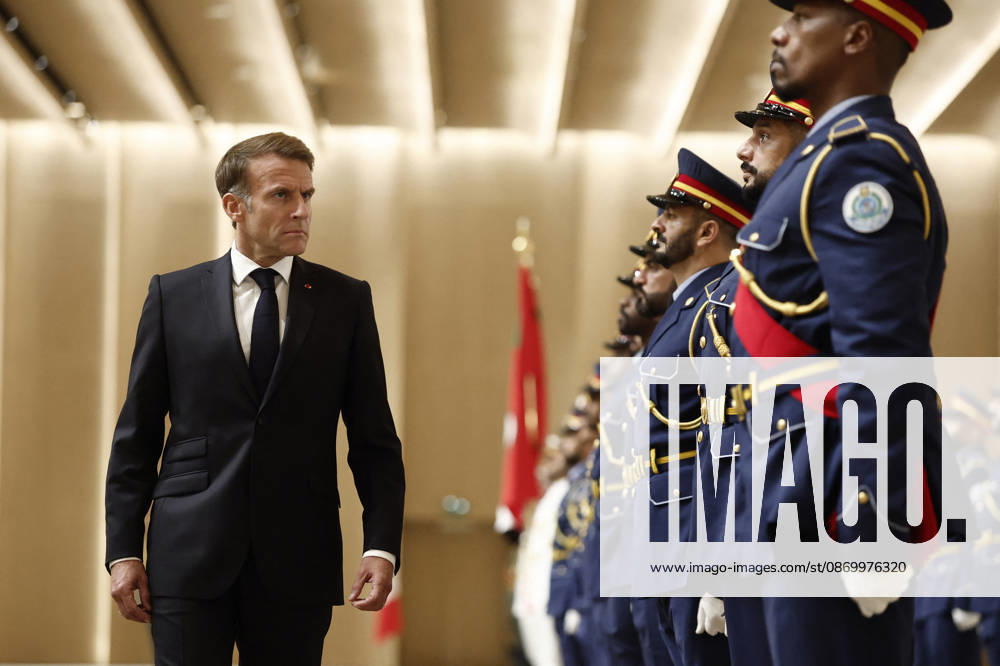 President Macron Visit To Middle East - Abu Dhabi French President Emmanuel Macron reviews troops upon his arrival at Zayed International Airport in Abu Dhabi, United Arab Emirates, October 19, 2026. Photo by Benoit Tessier Pool ABACAPRESS.COM Abu Dhabi United Arab Emirates