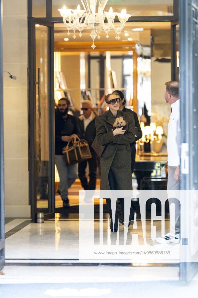 Céline Dion, accompanied by her sons Eddy and Nelson Angelil, leaves the Royal Monceau hotel for La Plenitude Arena in Paris after 16 concerts over five weeks in front of nearly 500,000 people, on October 19, 2026. Holding her dog, Madison, in her arms, the Canadian singer waved one last time to her fans gathered in front of the hotel. She will return to the Paris La Défense Arena for 10 special concerts from May 8 to 29, 2027. Pierre Perusseau Bestimage Céline Dion, accompanied by her sons Eddy and Nelson Angelil, leaves the Royal Monceau luxury hotel in Paris on October 19, 2026, following 16 concerts over five weeks performed before nearly 500,000 people. Holding her dog, Madison, in her arms, the Canadian singer waved one last time to