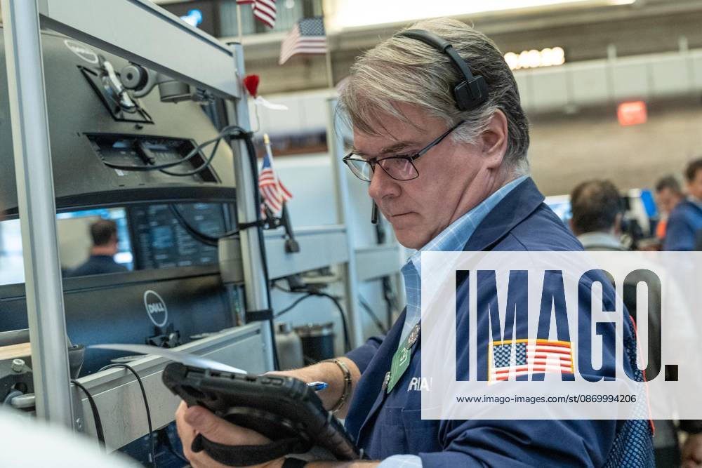 A trader works on the trading floor of the New York Stock Exchange (NYSE) during opening hours in New York, NY on October 19, 2026. New York USA - ZUMAr339 20261019_znp_r339_010