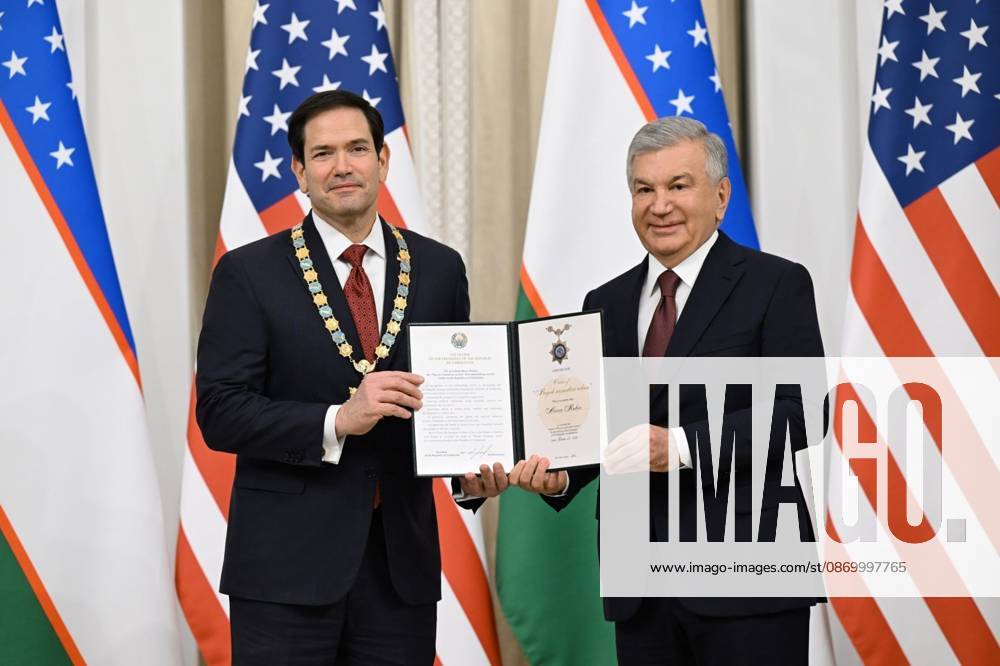 US Secretary of State Marco Rubio in Uzbekistan SAMARKAND, UZBEKISTAN - OCTOBER 19 : (---- - MANDATORY CREDIT - UZBEKISTAN PRESIDENCY HANDOUT - NO MARKETING NO ADVERTISING CAMPAIGNS - DISTRIBUTED AS A SERVICE TO CLIENTS----) Uzbek President Shavkat Mirziyoyev (R) presents the Order For Great Services to US Secretary of State Marco Rubio (L) who arrived to attend the C5+1 Central Asia-US Foreign Ministers Meeting and the second meeting of the Uzbekistan-US Business and Investment Council in Samarkand, Uzbekistan on October 19, 2026. Uzbekistan Presidency Anadolu Samarkand Uzbekistan. Editorial use only. Please get in touch for any other usage.