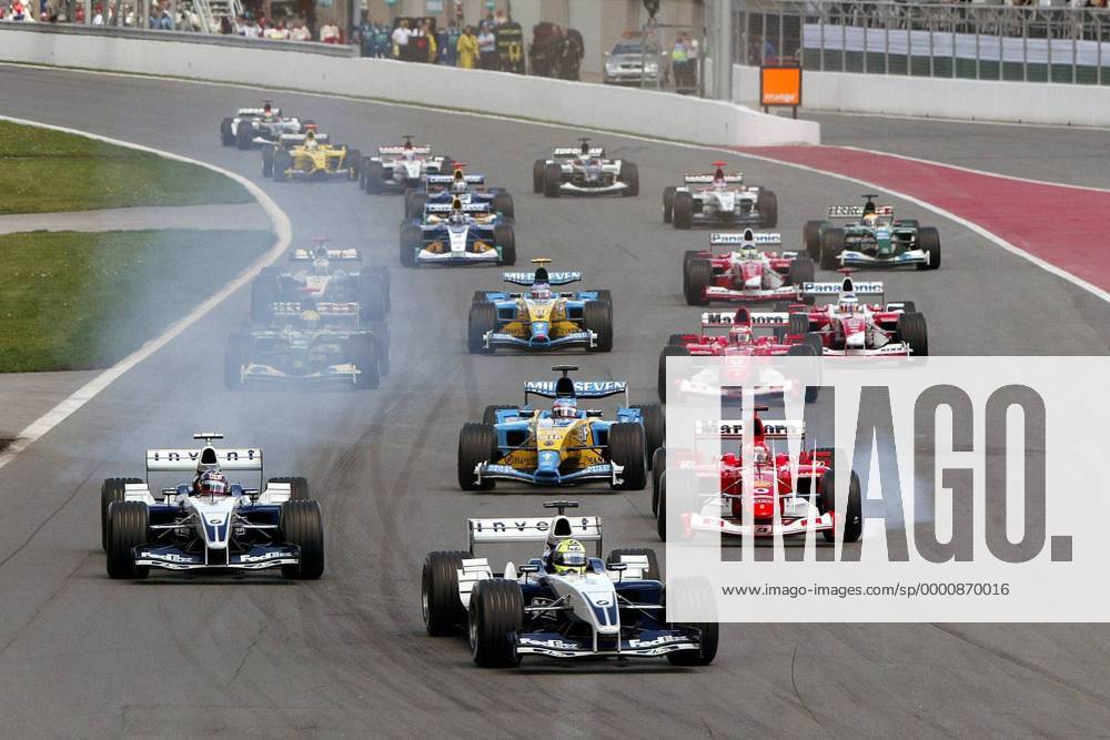 Start zum Großen Preis von Kanada 2003: Ralf Schumacher (Deutschland) führt das Fahrerfeld vor Juan Pablo Montoya (li., Kolumbien beide BMW-Williams) und Michael Schumacher (Deutschland Ferrari) an Motorsport Grand Prix Herren Großer Preis von Kanada 2003, Formel 1 Weltmeisterschaft, F1, F, GP, WM, Vdig Totale Montreal Dynamik, Spannung