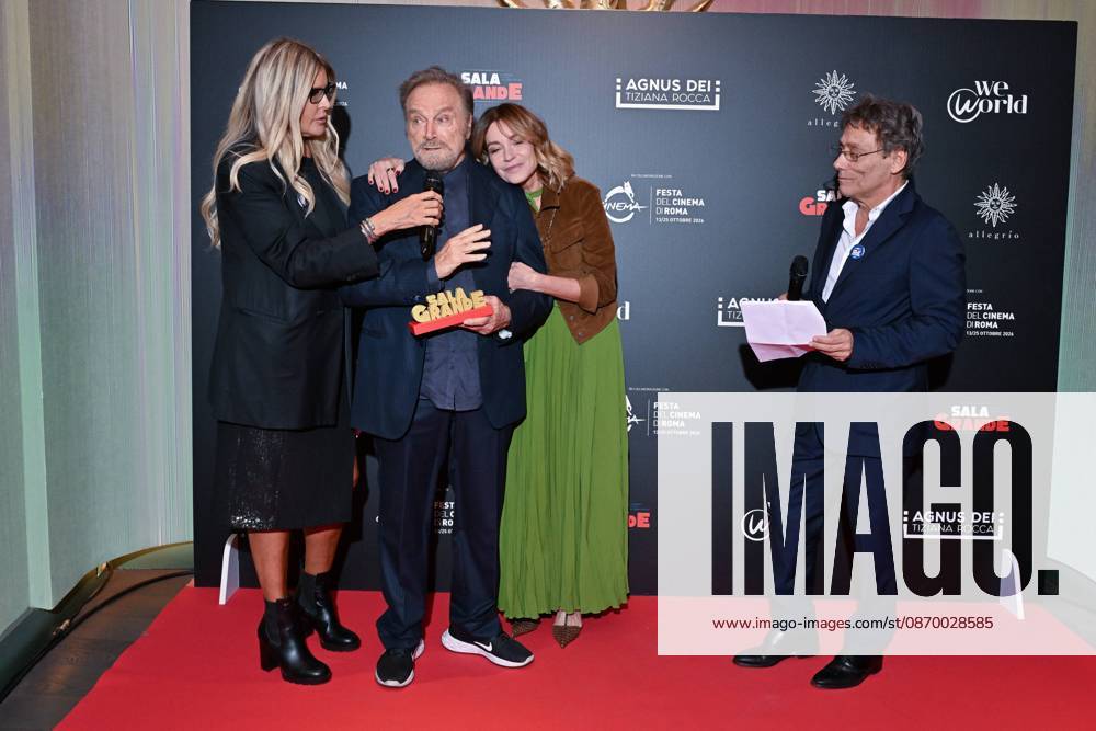 IPA89934672 - Rome: Allegrio Roma. Charity Event for WeWorld. Pictured: Tiziana Rocca, Franco Nero, Stefania Rocca, Flavio Natalia