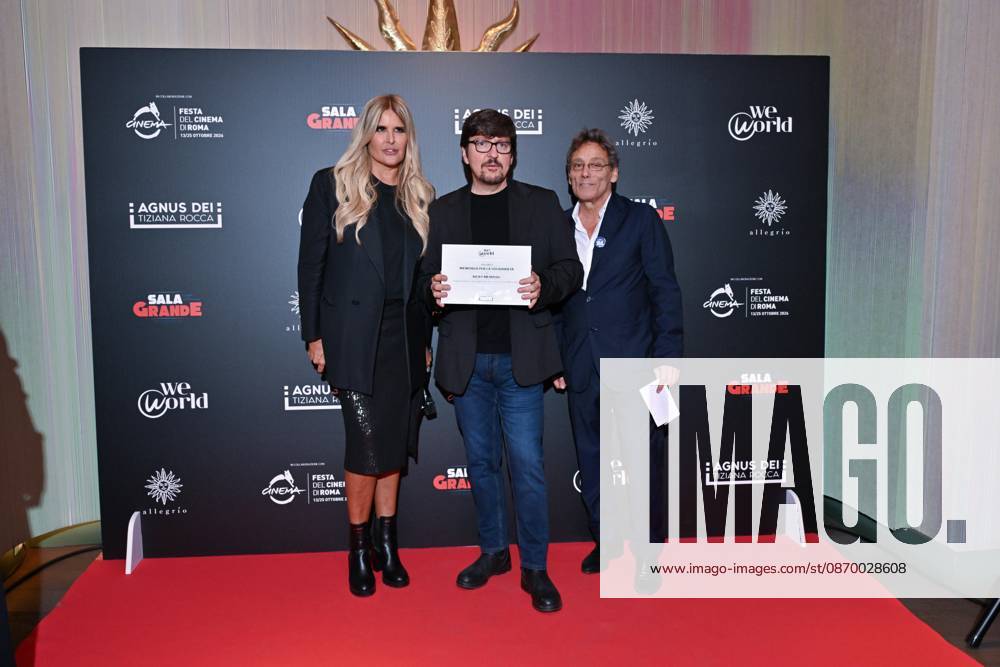 IPA89934722 - Rome: Allegrio Roma. Charity Event for WeWorld. Pictured: Tiziana Rocca, Ricky Memphis, Flavio Natalia