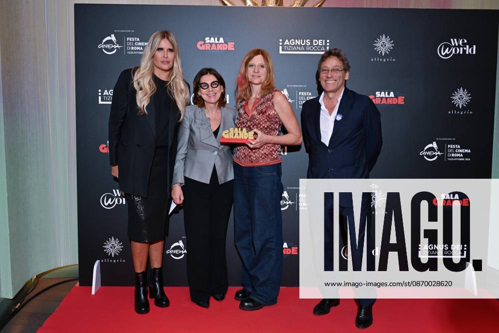 IPA89934728 - Rome: Allegrio Roma. Charity Event for WeWorld. Pictured: Tiziana Rocca, guest, Susanna Nicchiarelli, Flavio Natalia