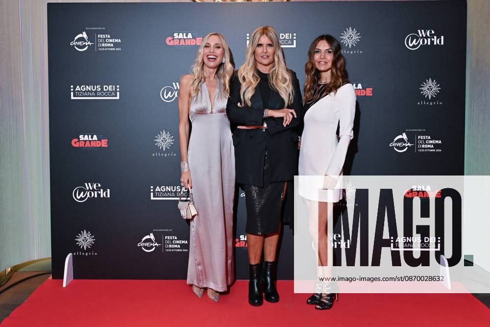 IPA89934759 - Rome: Allegrio Roma. Charity Event for WeWorld. Pictured: Tiziana Rocca and a guest