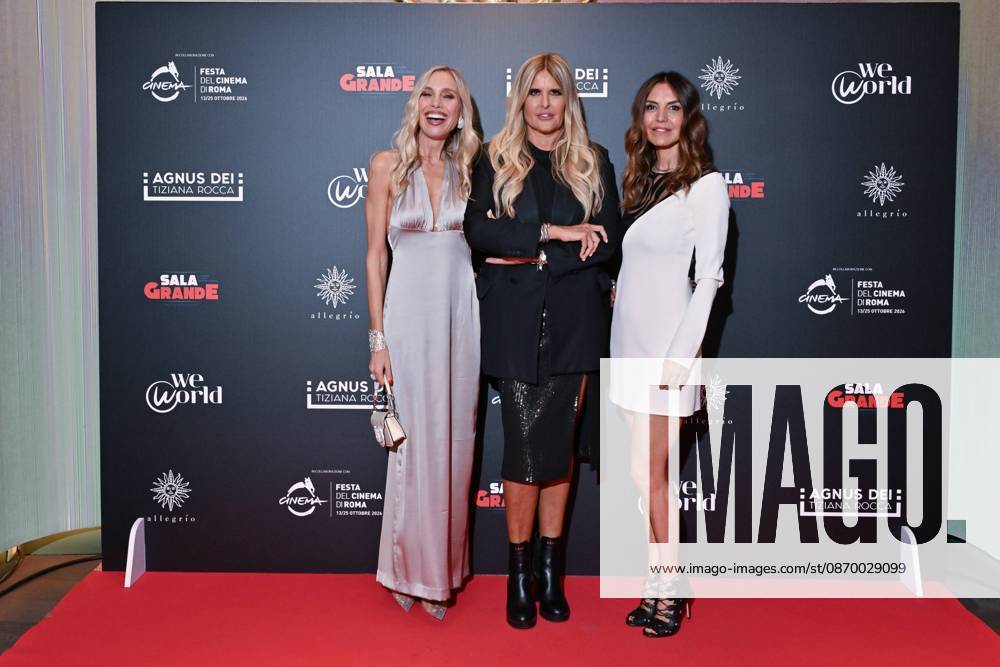 IPA89934760 - Rome: Allegrio Roma. Charity Event for WeWorld. Pictured: Tiziana Rocca and a guest