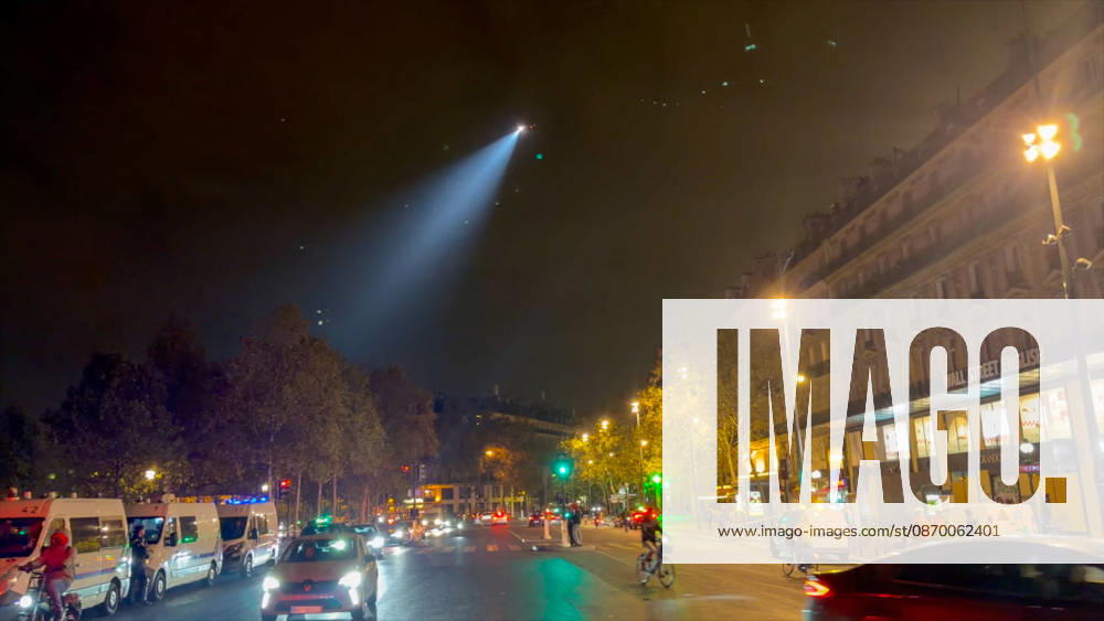 Helicopter Over Republic Square During Curfew - Paris Videograbs - A police helicopter overflies the Place de la République during the first night of an enforced overnight curfew following recent widespread urban unrest. Security forces patrolled empty streets in designated sectors to enforce the strict 11:00 p.m. to 6:00 a.m. movement restriction imposed in the capital after days of looting and clashes over high living costs. Paris, France, October 19, 2026. Photo by CLPRESS ABACAPRESS.COM Paris Ile-de-France France