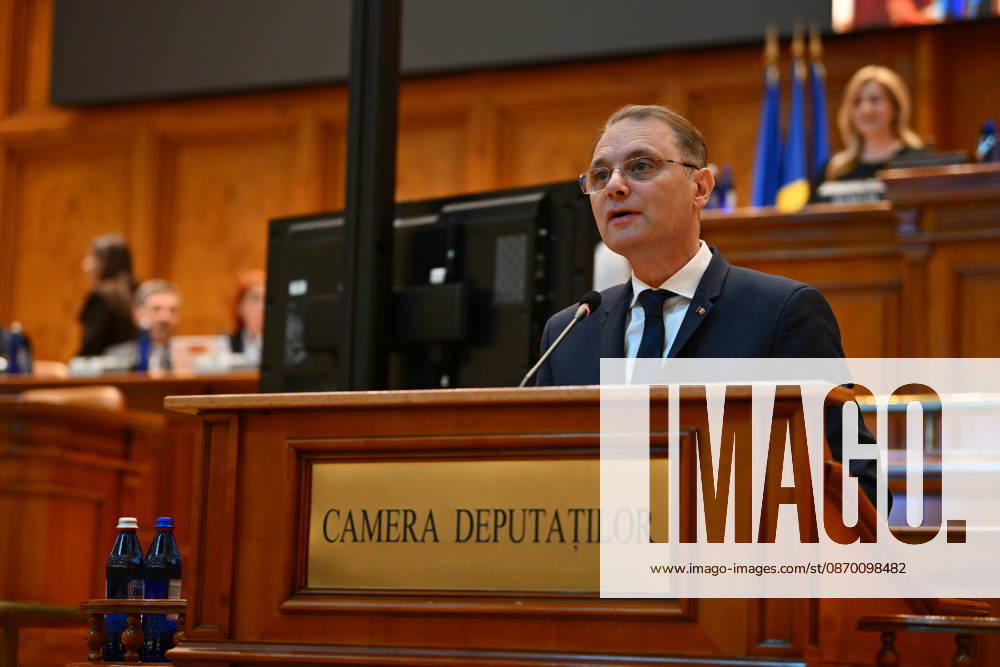 Prime Minister-designate Luca Niculescu addresses plenary session of the Romanian Parliament in Bucharest BUCHAREST, ROMANIA - OCTOBER 20: Prime Minister-designate Luca Niculescu, proposed by President of Romania Nicusor Dan, addresses a joint plenary session of the Romanian Parliament at the Palace of the Parliament in Bucharest, Romania on Tuesday, October 20, 2026. Niculescu presented his governing platform, fiscal reform agenda, and proposed cabinet lineup to lawmakers ahead of the vote of confidence. Alex Nicodim Anadolu Bucharest Romania. Editorial use only. Please get in touch for any other usage.