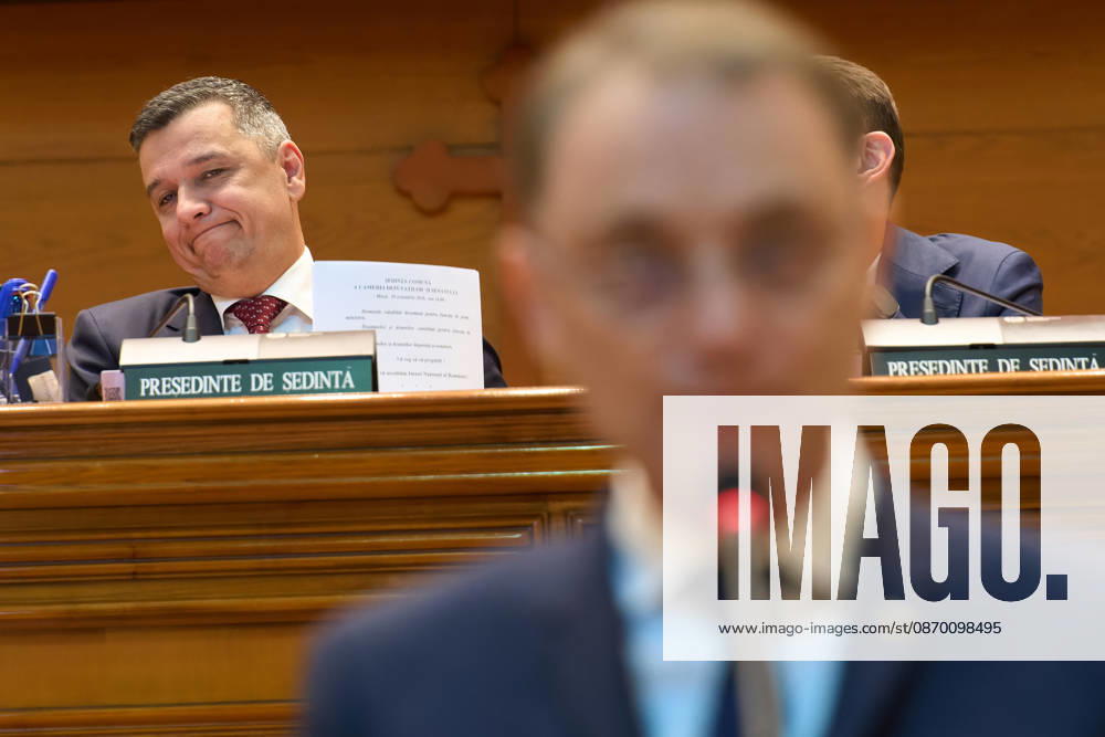 Luca Niculescu New Romanian Prime Minister Vote in Paliament Bucharest, Romania. 20th Oct, 2026: Social Democratic Party (PSD) leader Sorin Grindeanu (L) listens to the speech of Luca Niculescu, prime minister‘designate, during the vote on his cabinet in the Romanian Parliament. Bucharest Romania
