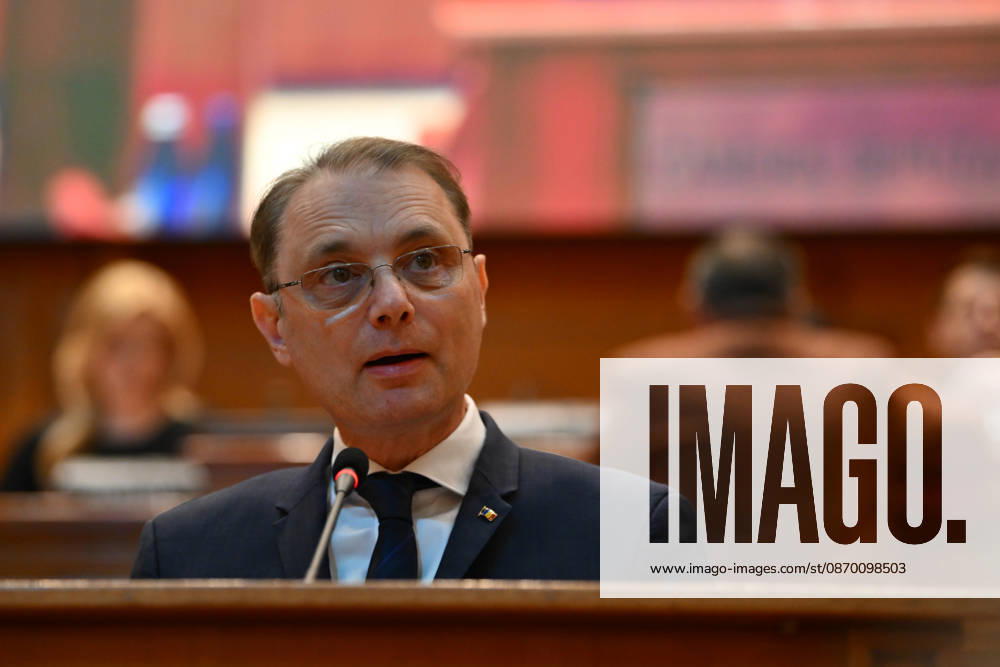 Prime Minister-designate Luca Niculescu addresses plenary session of the Romanian Parliament in Bucharest BUCHAREST, ROMANIA - OCTOBER 20: Prime Minister-designate Luca Niculescu, proposed by President of Romania Nicusor Dan, addresses a joint plenary session of the Romanian Parliament at the Palace of the Parliament in Bucharest, Romania on Tuesday, October 20, 2026. Niculescu presented his governing platform, fiscal reform agenda, and proposed cabinet lineup to lawmakers ahead of the vote of confidence. Alex Nicodim Anadolu Bucharest Romania. Editorial use only. Please get in touch for any other usage.