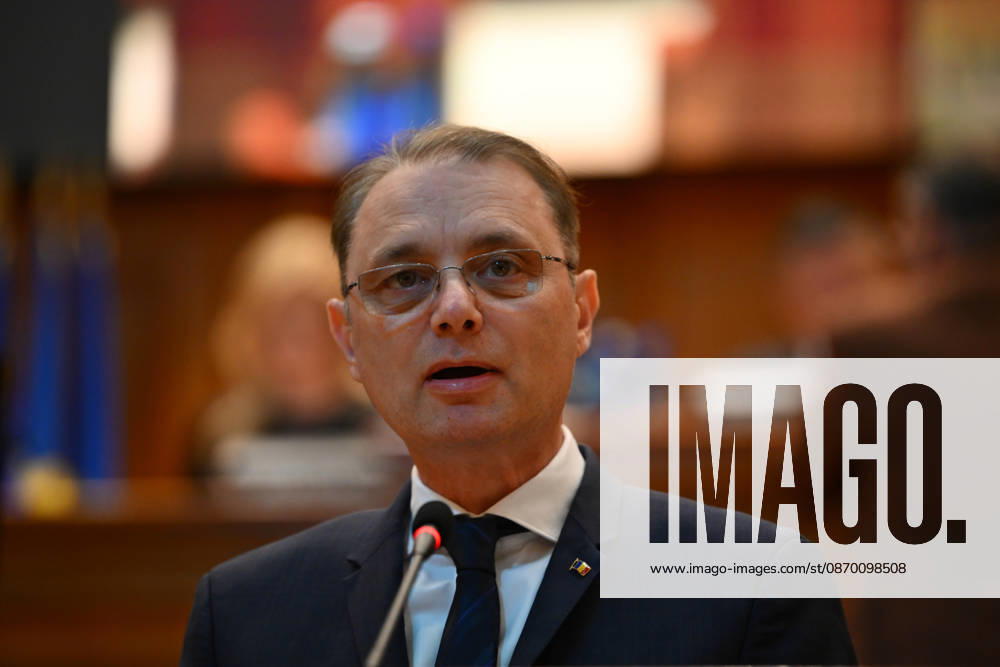 Prime Minister-designate Luca Niculescu addresses plenary session of the Romanian Parliament in Bucharest BUCHAREST, ROMANIA - OCTOBER 20: Prime Minister-designate Luca Niculescu, proposed by President of Romania Nicusor Dan, addresses a joint plenary session of the Romanian Parliament at the Palace of the Parliament in Bucharest, Romania on Tuesday, October 20, 2026. Niculescu presented his governing platform, fiscal reform agenda, and proposed cabinet lineup to lawmakers ahead of the vote of confidence. Alex Nicodim Anadolu Bucharest Romania. Editorial use only. Please get in touch for any other usage.