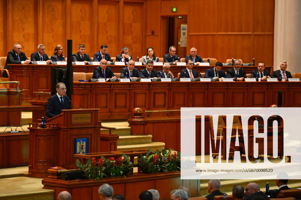 Prime Minister-designate Luca Niculescu addresses plenary session of the Romanian Parliament in Bucharest BUCHAREST, ROMANIA - OCTOBER 20: Prime Minister-designate Luca Niculescu, proposed by President of Romania Nicusor Dan, addresses a joint plenary session of the Romanian Parliament at the Palace of the Parliament in Bucharest, Romania on Tuesday, October 20, 2026. Niculescu presented his governing platform, fiscal reform agenda, and proposed cabinet lineup to lawmakers ahead of the vote of confidence. Alex Nicodim Anadolu Bucharest Romania. Editorial use only. Please get in touch for any other usage.