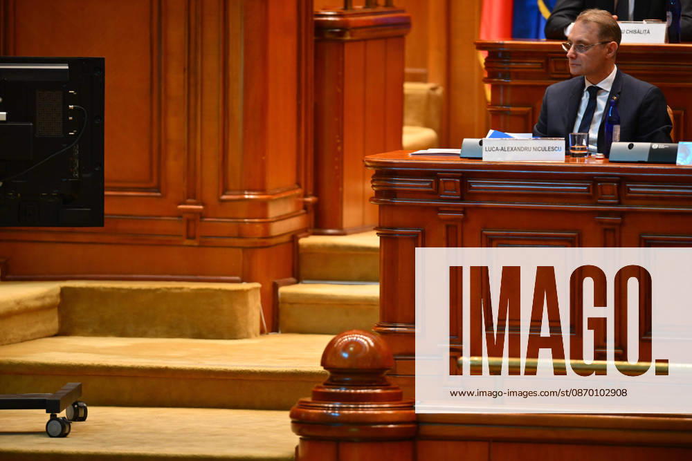 Plenary session of the Romanian Parliament in Bucharest BUCHAREST, ROMANIA - OCTOBER 20: Romania s prime minister-designate Luca Niculescu addresses a joint plenary session of the Romanian Parliament at the Palace of the Parliament in Bucharest, Romania on October 20, 2026. Niculescu presented his governing platform, fiscal reform agenda, and proposed cabinet lineup to lawmakers ahead of the vote of confidence. Alex Nicodim Anadolu Bucharest Romania. Editorial use only. Please get in touch for any other usage.