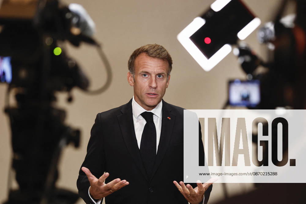 President Macron At The Opswf Summit During His Visit To Qatar French President Emmanuel Macron gestures as he speaks to members of the media on the day of the 9th Annual One Planet Sovereign Wealth Funds (OPSWF) Summit, in Lusail, Qatar, October 21, 2026. Photo by Benoit Tessier Pool ABACAPRESS.COM Lusail Qatar
