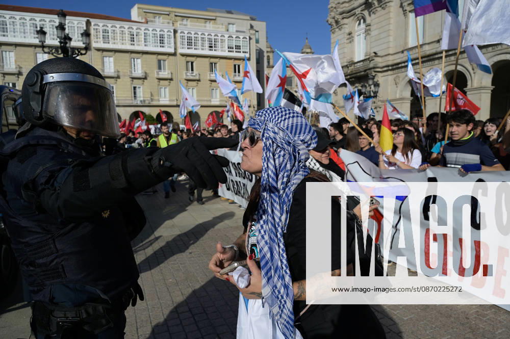 Protest Against Abascal s Event in A Coruna A police officer gives instructions to a person during a rally against the visit of Vox leader Santiago Abascal on October 21, 2026, in A Coruna, Galicia, Spain. Several people gathered, organized by far-left movements, to boycott the Vox leader’s visit to the Galician city. October 21, 2026. A Coruna, Galicia. A Coruna, Galicia, Spain.
