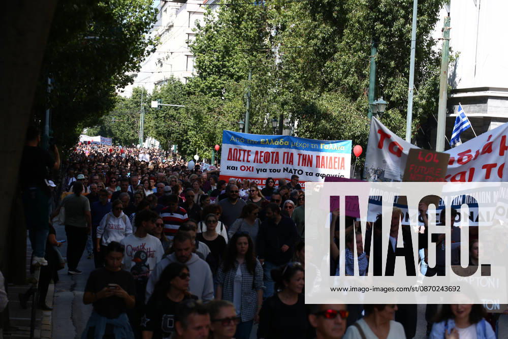 Students, school pupils, teachers and university professors take part in a large education protest. Thousands of demonstrators march through the city center, carrying banners and chanting slogans during the mass mobilization. Athens GREECE - ZUMAx103 20261021_zip_x103_016