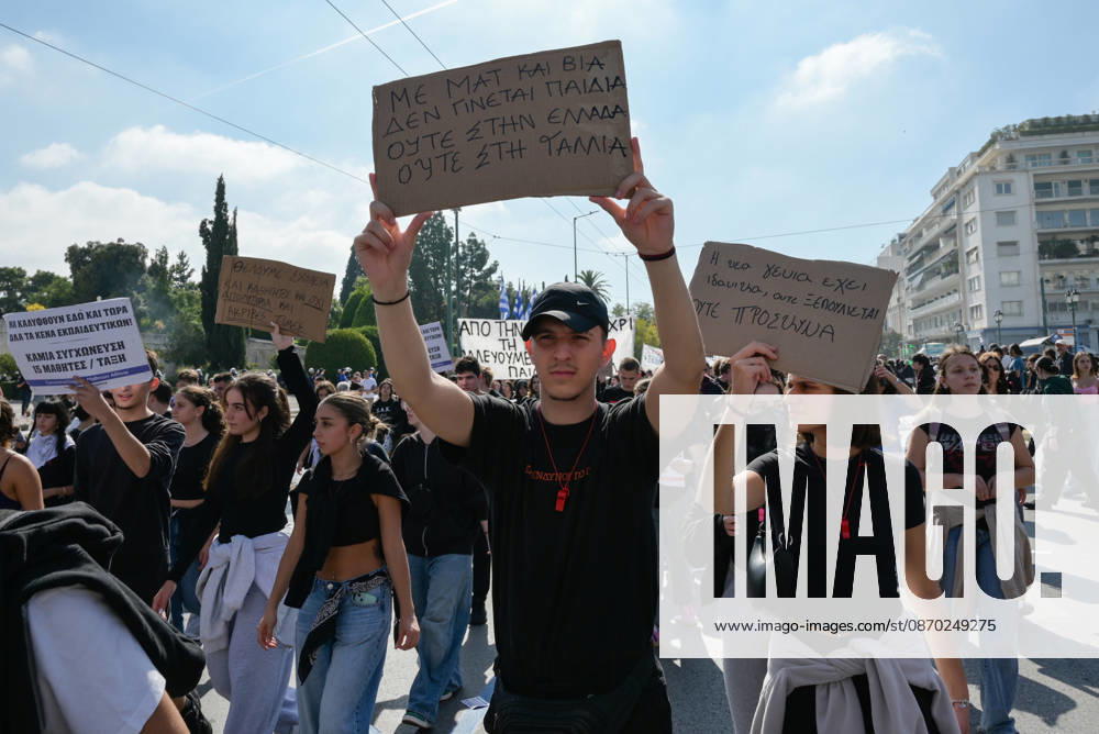 Students and teachers protest over education funding and living costs in Athens Students march through central Athens holding signs during a demonstration demanding increased funding for public education and measures to address rising living costs. Athens Greece