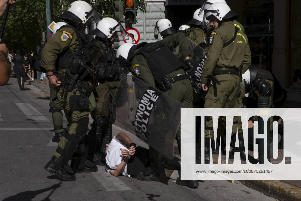 Athens Greece Living Costs Protest Riot police detain a person during a protest in Athens, Greece on October 21, 2026. Students and other demonstrators marched through central Athens to protest rising living costs and economic pressures. Organizers say the concerns raised by participants echo grievances voiced during recent demonstrations in France. Athens Attica Greece