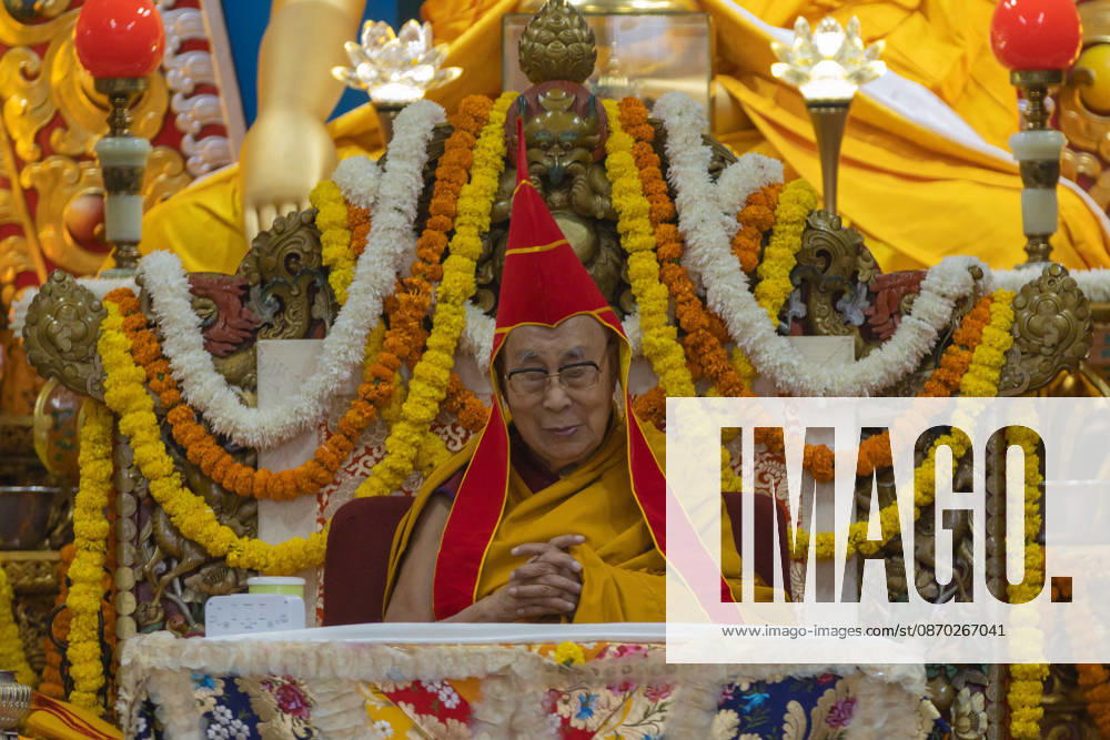 Tibetan Spiritual leader the Dalai Lama wearing ceremonial red hat during a Long Life Prayer offered to him by TIPA, Norbulingka Institute and Nepal Tibetan Lhamo Association at Tsuglakhang Temple, Mcleodganj, Dharamshala on Wednesday. Dharamshala India - ZUMAb235 20261021_zip_b235_018
