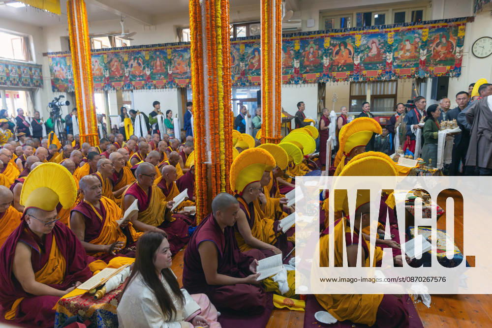 Exiled Tibetan Buddhist monk in ceremonial yellow hats chants tibetan mantraâ€⠢s during a Long Life Prayer offered to Tibetan Spiritual leader the Dalai Lama by TIPA, Norbulingka Institute and Nepal Tibetan Lhamo Association at Tsuglakhang Temple, Mcleodganj, Dharamshala on Wednesday. Dharamshala India - ZUMAb235 20261021_zip_b235_003