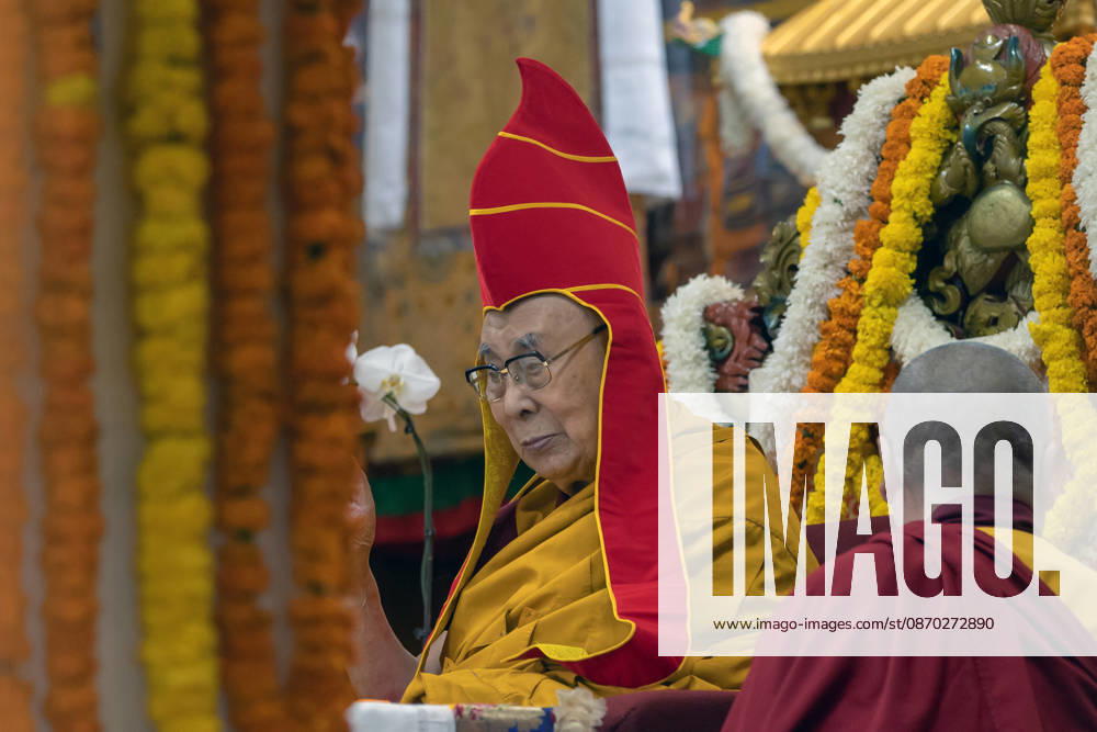 Tibetan Spiritual leader the Dalai Lama wearing ceremonial red hat during a Long Life Prayer offered to him by TIPA, Norbulingka Institute and Nepal Tibetan Lhamo Association at Tsuglakhang Temple, Mcleodganj, Dharamshala on Wednesday. Dharamshala India - ZUMAb235 20261021_zip_b235_026