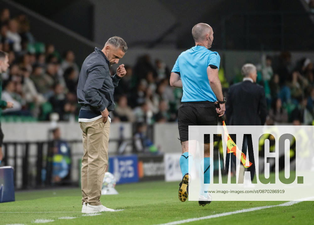 Sporting CP coach RUI BORGES looks down on the touchline as an assistant referee passes during the UEFA Champions League league phase matchday three game against LASK at Estadio Jose Alvalade in Lisbon, Portugal, on October 21, 2026. Lisbon Portugal - ZUMAr238 20261021_zip_r238_036