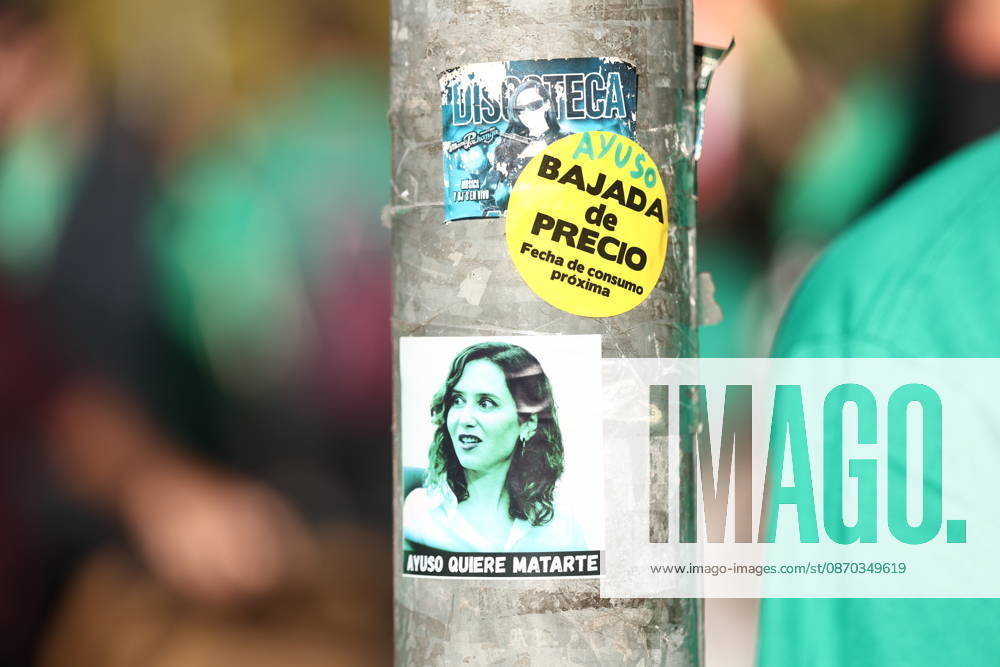 Rally at the Madrid Assembly in Support of the Indefinite Education Strike: Stickers with slogans such as Ayuso, Lower Prices, Use By Date, and Ayuso Wants to Kill You during a rally for public education in front of the Madrid Assembly on October 22, 2026, in Madrid, Spain. Public school teachers in the Community of Madrid began an indefinite strike on October 14 to demand more resources and better working conditions, called by the unions CCOO, CGT, CNT, Solidaridad Obrera, STEM, and UGT, as well as by the teacher advocacy groups Dignified Special Education, Fewer Class Periods, and We Want Vocational Training. Among their main demands are the restoration of a maximum of 17 class periods per week in secondary education and voca