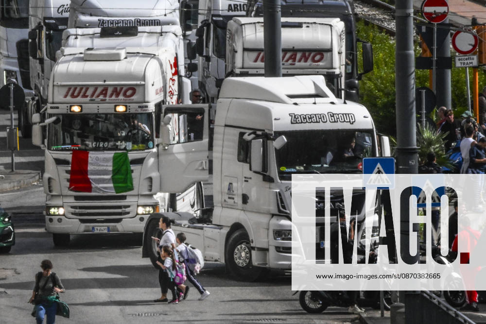 A slow-moving procession of trucks took place today in Naples. The heavy vehicles which have been stationed for days on Via Argine, blocking the exit for fuel tankers and consequently causing a shortage of gasoline and diesel at service stations moved toward the port before returning to Via Argine, leading to severe traffic disruptions, October 22, 2026. The drivers explained the reasons for their protest to passersby; many expressed that they are disappointed with the decree just enacted by the government.Rome, October 22, 2026 ANSA CIRO FUSCO Napoli ITALIA - ZUMAa110 20261022_zaf_a110_018