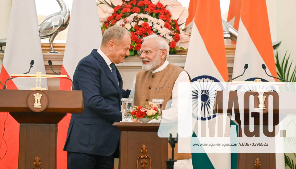 Prime Minister Narendra Modi (R) speaks with Prime Minister of Poland Donald Tusk (L) during a joint press statement following delegation-level bilateral talks at Hyderabad House on October 22, 2026 in New Delhi, India. The high-level meeting marked Polish Prime Minister Tusk s official visit to India from October 21-23, 2026 his first visit to the country as Prime Minister since 2010 aimed at advancing the India-Poland Strategic Partnership and deepening India-EU strategic ties. During wide-ranging discussions, both leaders reviewed bilateral cooperation across key sectors including trade, technology, defense-industrial collaboration, and energy, while reaffirming joint commitment toward peaceful diplomatic s