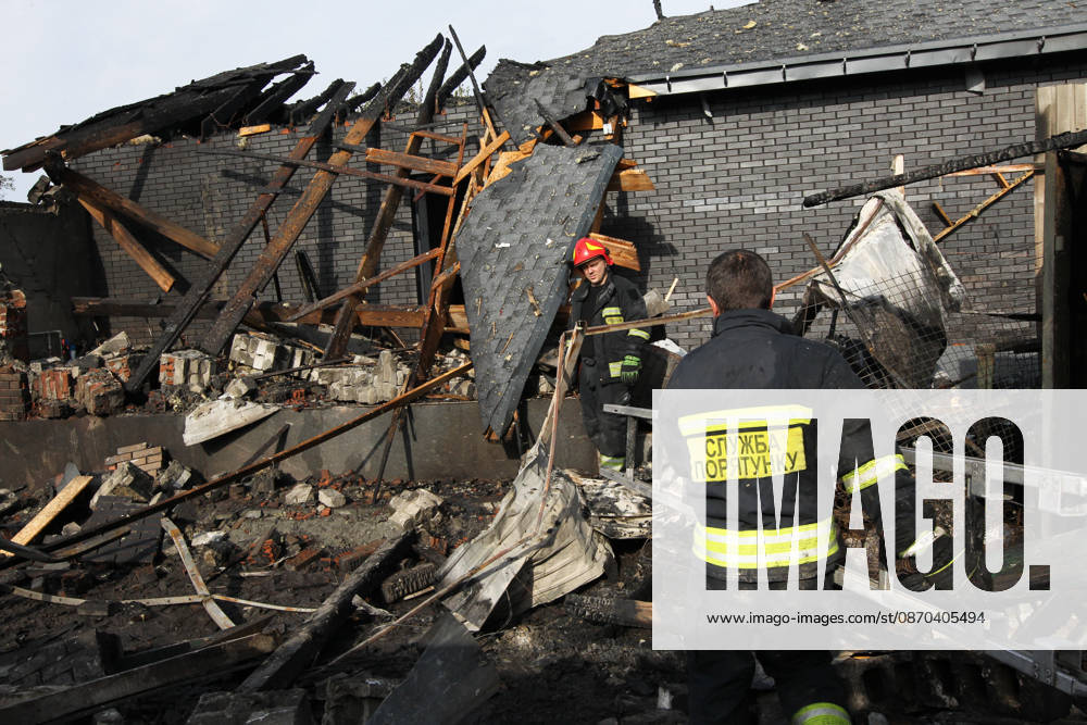 Rescuers respond to a Russian attack on a residential area in Dnipro, Ukraine, October 22, 2026. According to city head Borys Filatov, 11 private houses were damaged in the strike on Thursday morning, and one home burned down completely. (Photo by Mykola Miakshykov Ukrinform) Russian army attacks residential area in Dnipro
