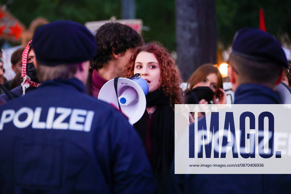 AUSTRIA, VIENNA - OCTOBER 22, 2026: A young woman uses a loudspeaker during a protest against the underfunding of public universities in Austria Vienna Austria - ZUMAt113 20261022_zaa_t113_679