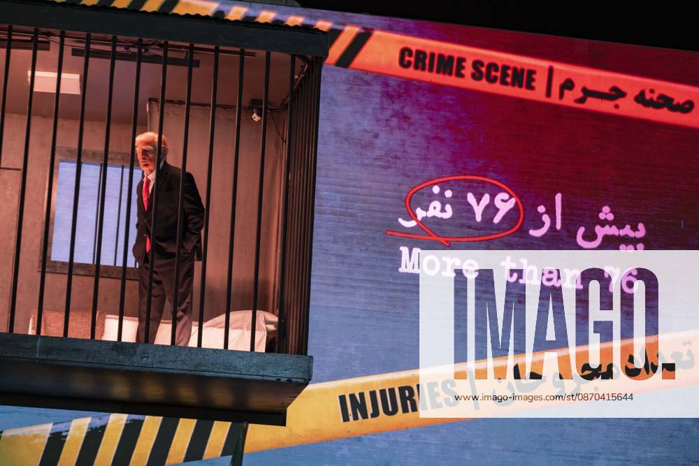 Anti-U.S. President Trump Performance On Billboard An Iranian masked man performs as U.S. President Donald Trump inside a symbolic cell mounted on a billboard in northern Tehran, Iran, on October 21, 2026. Tehran Tehran Iran