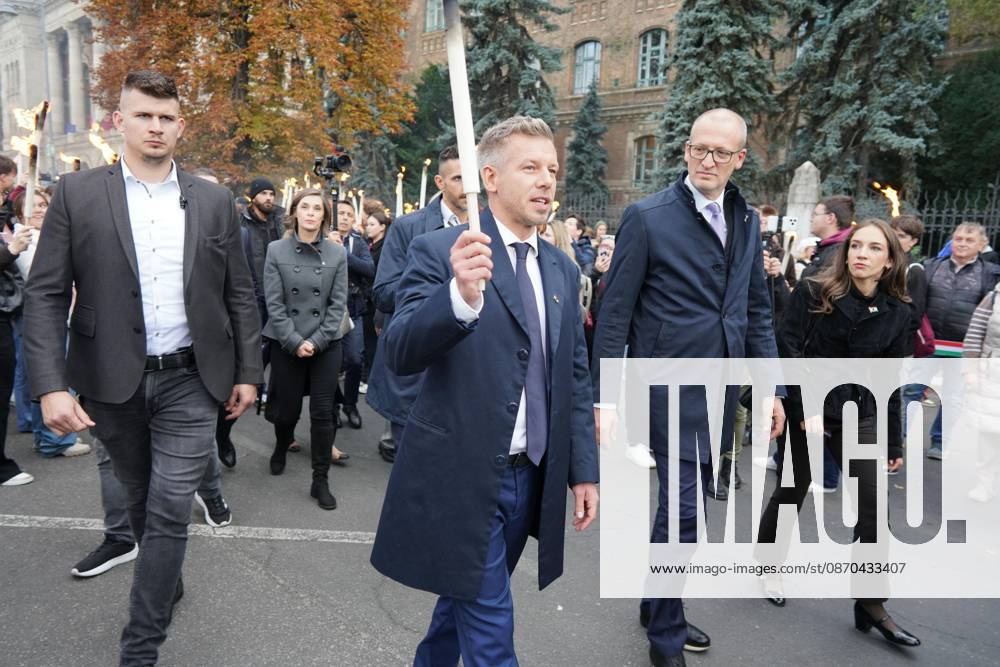 March of the Hungarian Prime Minister s party (Tisza Party) on the eve of the October 23 national holiday, commemorating the 70th anniversary of the 1956 Hungarian Revolution. October 23, 2026, marks the historic 70th anniversary of the 1956 Hungarian Revolution, a nationwide uprising against Soviet occupation and oppressive communist rule. This landmark anniversary is being observed through massive, solemn, and highly modernized nationwide commemorations across Hungary. Budapest Hungary - ZUMAp159 20261022_int_p159_523