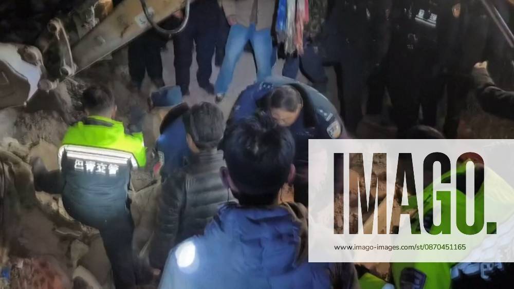 This screen grab made from the CCTV+ footage released on October 23, 2026 shows rescuers searching through ruins with flashlight after a 7.0-magnitude earthquake on October 23, 2026 in Nagqu, Xizang Autonomous Region of China. At least 16 people have been killed and 11 seriously injured as of 05:20 on Friday after a 7.0-magnitude earthquake hit southwest China s Xizang Autonomous Region on Thursday night, according to Nagqu City s earthquake relief headquarters.