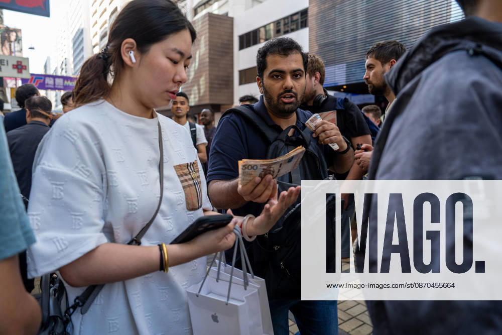 First Day on sale of IPhone Duo in Hong Kong An iPhone reseller trying to buy an iPhone duo from a woman outside an Apple Store on October 22, 2026 in Hong Kong. The iPhone DUO is Apple INC.s first foldable phone, today is the first day the new iPhone DUO is available to the public. (Photo by Vernon Yuen Nexpher Images) HONG KONG HONG KONG