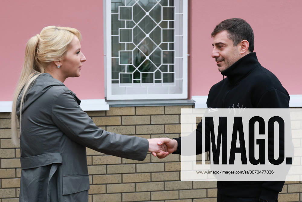 BELARUS, GOMEL REGION - OCTOBER 23, 2026: Russia s Human Rights Commissioner Yana Lantratova (L) and Ukraine s Human Rights Commissioner Dmytro Lubinets shake hands during a Russian-Ukrainian exchange of prisoners-of-war at Novaya Guta. Alexander Shcherbak TASS 99801614