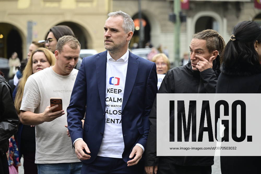 Pirates MPs Zdenek Hrib, middle, and Ivan Bartos, right, demonstrate against the governing coalition s plan to abolish license fees for Czech Television (CT) and Czech Radio (CRo), on the Lesser Town Square, in Prague, Czech Republic, on October 23, 2026. The hastily organized protest was a response to the fact that coalition lawmakers today pushed through a motion in the Chamber of Deputies to give priority to the first reading of this bill. (CTKxPhoto RomanxVondrous) CTKPhotoP2026102304872 CTKPhotoP2026102304872