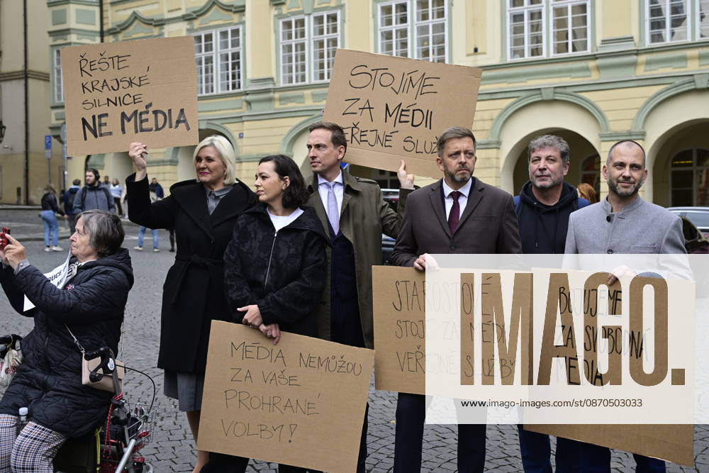 STAN MPs, from left with banners, Vera Kovarova, Barbora Urbanova, Karel Dvorak, Vit Rakusan, Jan Lacina and Jan Berki demonstrate against the governing coalition s plan to abolish license fees for Czech Television (CT) and Czech Radio (CRo), on the Lesser Town Square, in Prague, Czech Republic, on October 23, 2026. The hastily organized protest was a response to the fact that coalition lawmakers today pushed through a motion in the Chamber of Deputies to give priority to the first reading of this bill. (CTKxPhoto RomanxVondrous) CTKPhotoP2026102304876 CTKPhotoP2026102304876