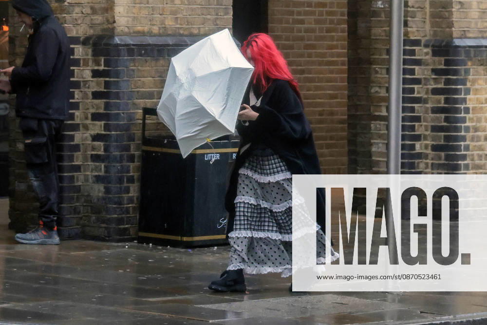 London, United Kingdom. Storm Austen Begins To Bite In London. People struggle in the winds at London ridge as storm Austen begins To bite In London.