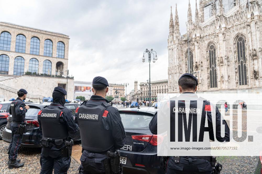 IPA90074260 - Milan, October 23, 2026. The city center is preparing for tomorrows heavily secured Saturday ahead of the march. From police and Carabinieri checkpoints at the Duomo to storefronts reinforced with panels to prevent break-ins on Via Torino.