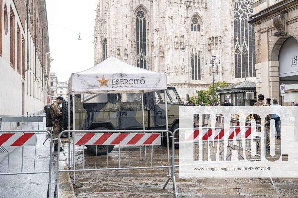 IPA90074283 - Milan, 10 26 23. The city center is preparing for tomorrows heavily secured Saturday ahead of the march. From police and Carabinieri checkpoints at the Duomo to storefronts reinforced with panels to prevent break-ins on Via Torino.