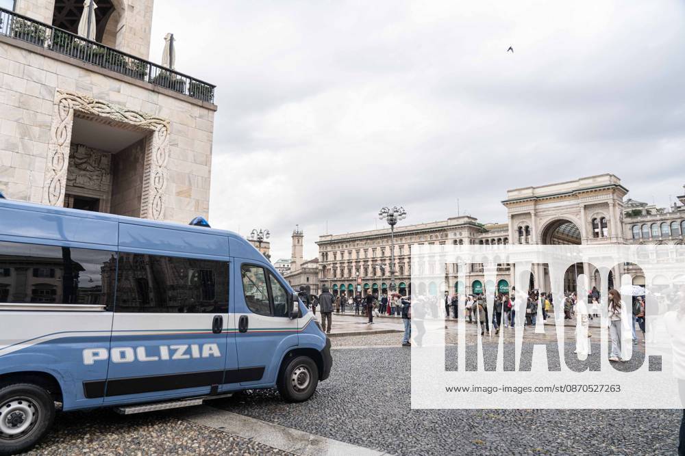 IPA90074235 - Milan, 10 26 23. The city center is preparing for tomorrows heavily secured Saturday ahead of the march. From police and Carabinieri checkpoints at the Duomo to storefronts reinforced with panels to prevent break-ins on Via Torino.
