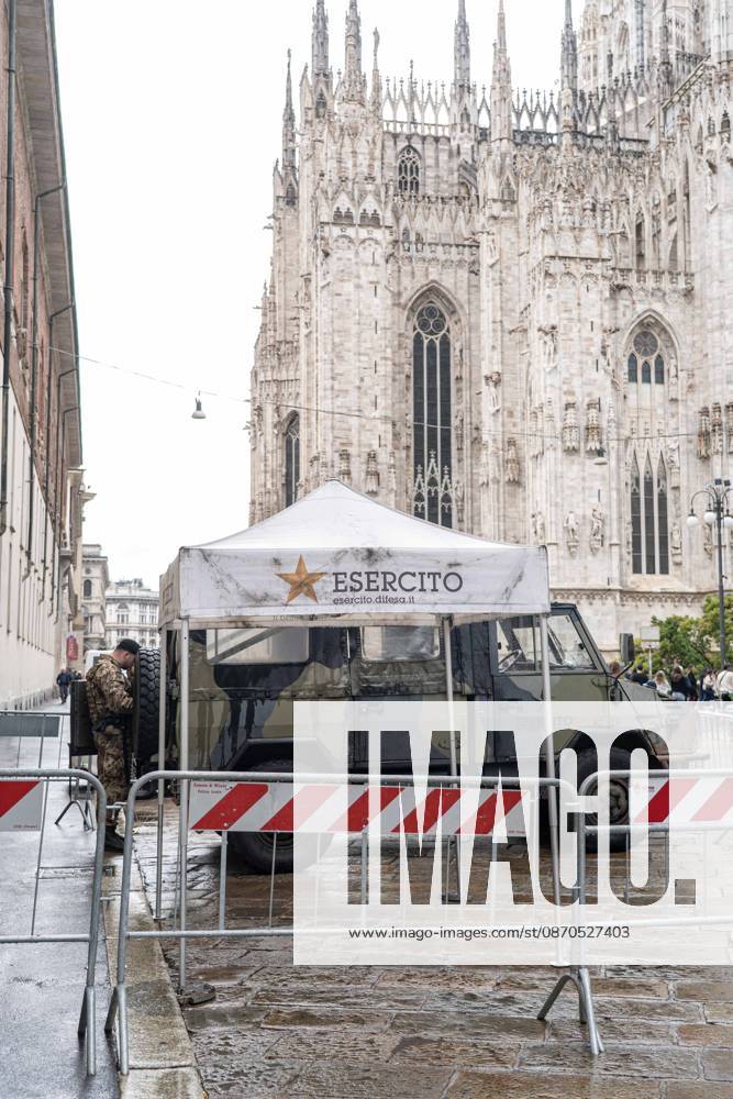 IPA90074280 - Milan, 10 26 23: The city center is preparing for tomorrows heavily secured Saturday ahead of the march. From police and Carabinieri checkpoints at the Duomo to storefronts reinforced with panels to prevent break-ins on Via Torino.