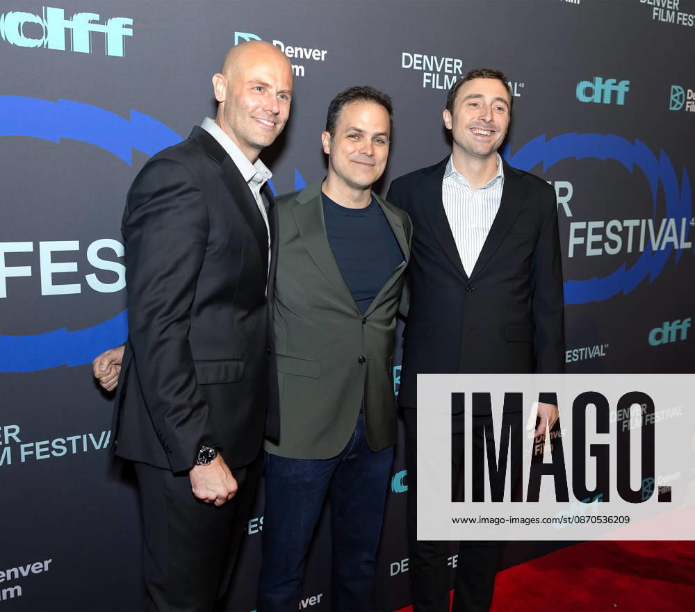 CEO of DFF KEVIN SMITH, Screen writer PETER GAMBLE of the film I Play Rocky, and DFF Artistic Director MATT CAMPBELL pose for a photo during the 49th. Denver Film Festival Red Carpet event at the Ellie Caulkins Opera House Thursday night. Credit Image: ZUMA Press Wire) Denver USA - ZUMAav4_ 20261023_zaf_av4_017