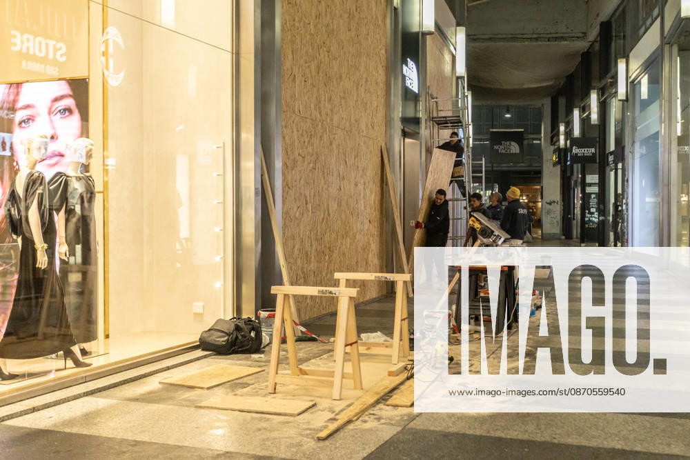 Shops in Milan board up windows ahead of cost-of-living protest MILAN, ITALY - OCTOBER 23: On the eve of an unauthorized demonstration against the high cost of living, some shop windows are being coverded with wooden panels for protection in Milan, Italy, on October 23, 2026. This measure follows the destruction and looting that took place in Milan the previous weekend during similar protests against the high cost of living. Andrea Carrubba Anadolu Milan Italy. Editorial use only. Please get in touch for any other usage.