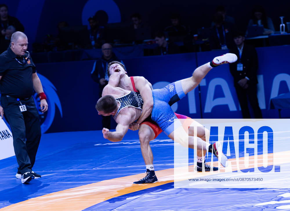 Astana, 2021 World Wrestling Championshi, Kazakhstan: Finland s Jonni Kunnari Sarkkinen (red) competes against Croatia s Antonio Kamenjasevic (blue) in the men s Greco-Roman 77kg competition at the Senior World Wrestling Championships in Astana, Kazakhstan, on October 24, 2026. Sarkkinen won the bout 7-2. . Astana Kazakhstan - ZUMAt172 20261024_zip_t172_004