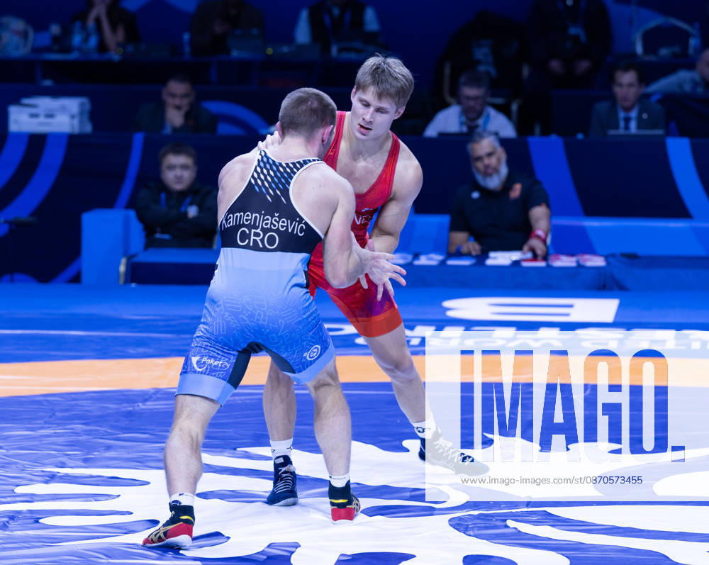 Astana, 2021 World Wrestling Championshi, Kazakhstan: Finland s Jonni Kunnari Sarkkinen (red) competes against Croatia s Antonio Kamenjasevic (blue) in the men s Greco-Roman 77kg competition at the Senior World Wrestling Championships in Astana, Kazakhstan, on October 24, 2026. Sarkkinen won the bout 7-2. . Astana Kazakhstan - ZUMAt172 20261024_zip_t172_007