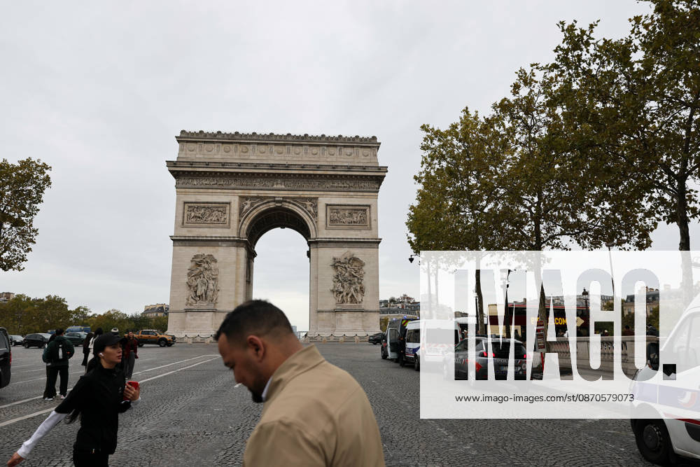 (261024) -- PARIS, Oct. 24, 2026 -- Security vehicles are seen near the Arc de Triomphe in Paris, France, Oct. 24, 2026. French Interior Minister Laurent Nunez said Tuesday that the government would deploy soldiers from the French army s Operation Sentinelle to help prevent violence during the demonstrations announced for Oct. 24. ) FRANCE-PARIS-PROTEST-SECURITY WuxHuiwo