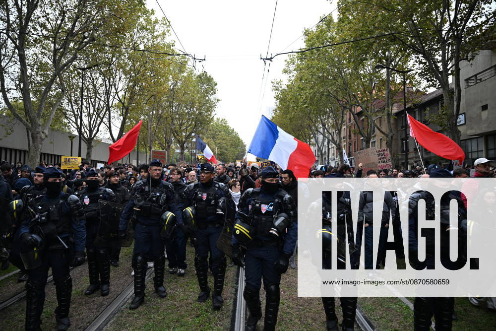 Demonstrators gather near Porte d Italie amid ongoing protests in Paris PARIS, FRANCE - OCTOBER 24: Demonstrators gather near Porte d Italie in southern Paris, chanting slogans ahead of planned marches, while security forces closely monitor the area in Paris, France, on October 24, 2026. Mouneb Taim Anadolu Paris France. Editorial use only. Please get in touch for any other usage.
