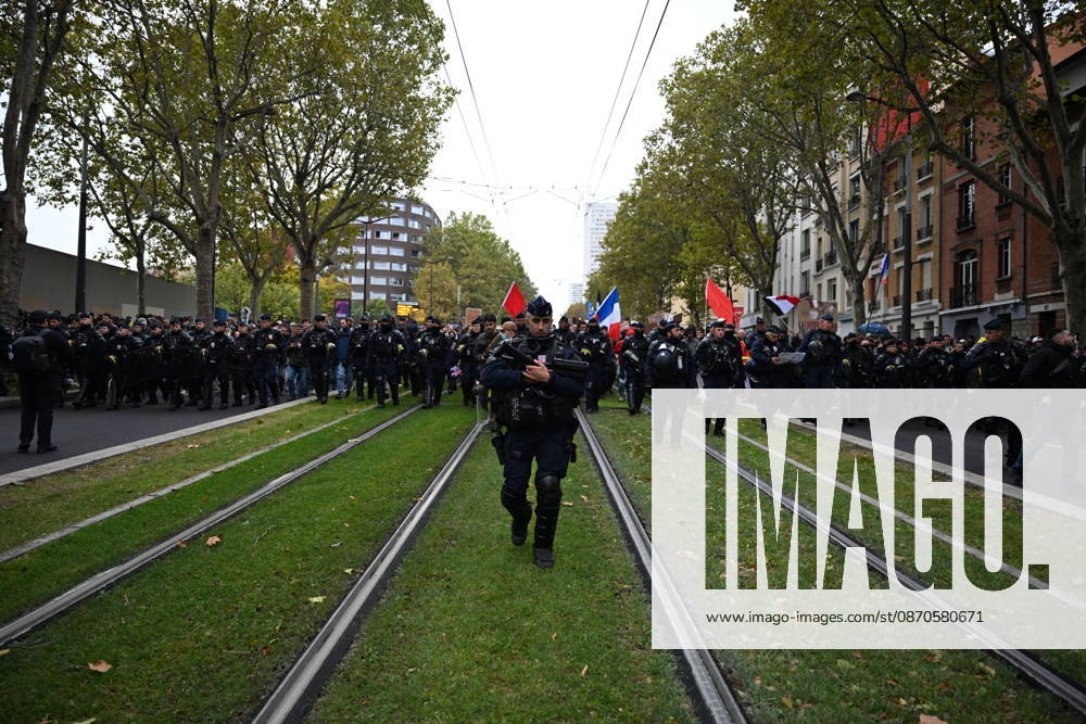 Demonstrators gather near Porte d Italie amid ongoing protests in Paris PARIS, FRANCE - OCTOBER 24: Demonstrators gather near Porte d Italie in southern Paris, chanting slogans ahead of planned marches, while security forces closely monitor the area in Paris, France, on October 24, 2026. Mouneb Taim Anadolu Paris France. Editorial use only. Please get in touch for any other usage.